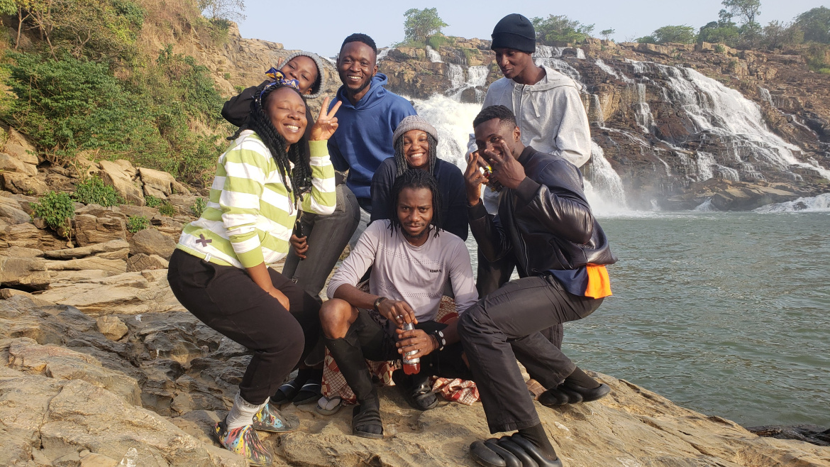 Campers at Crossover Camp Season 2 in Niger State, sharing meals, laughter, and cultural performances by the river.