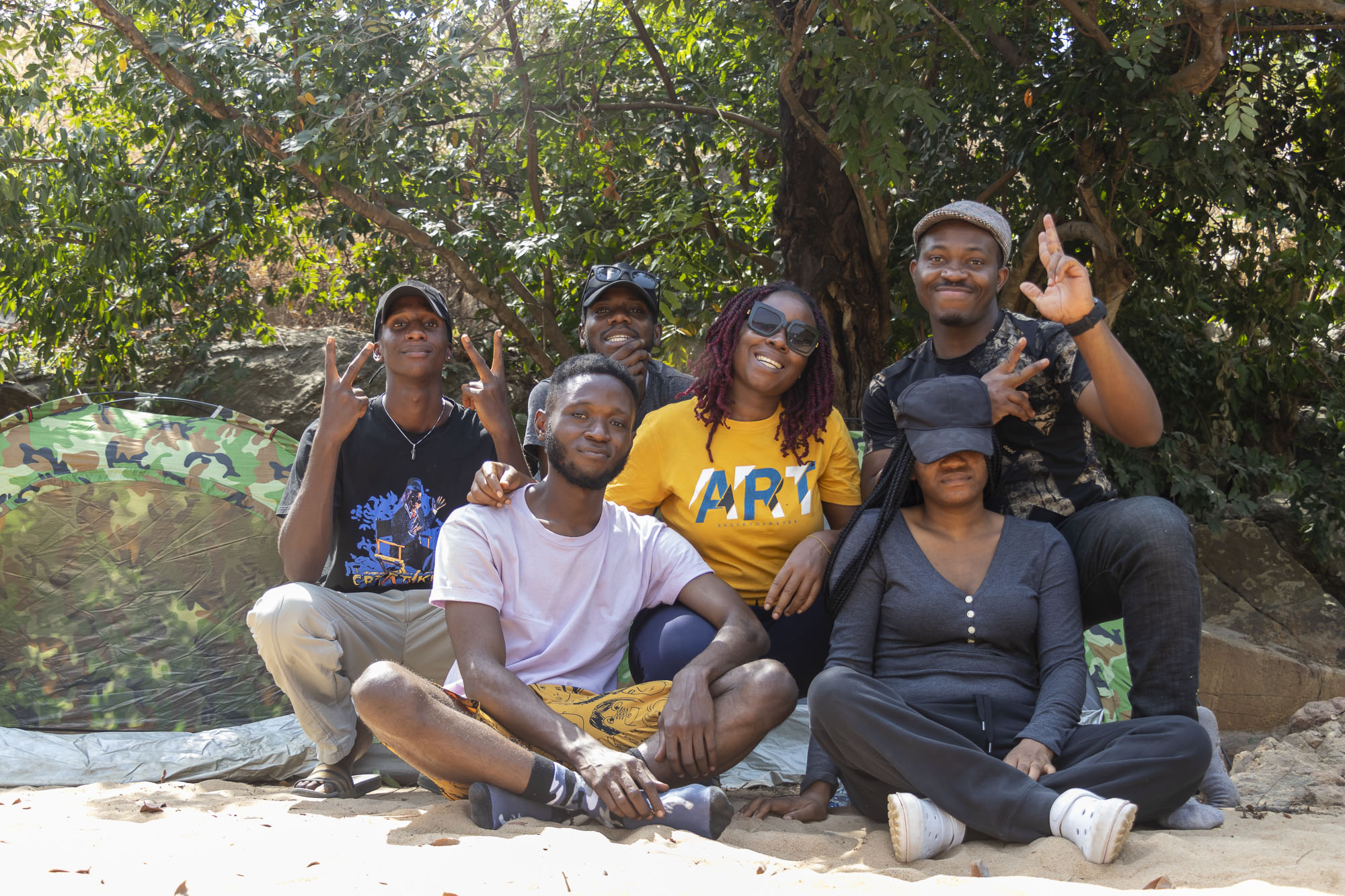 Campers from Crossover Camp Season 1 smiling and posing together at Gurara Waterfalls, Niger State
